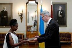 4-1 Ambassador Immaculee Uwanyiligira presents her letters of credence to President Valdis Zatlers at the Riga Castle (Courtesy photo)