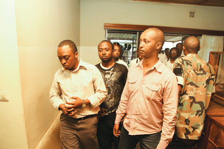 (L-R) Singer Faycal and Joseph Mushyoma, C.E.O of the East African Promoters heading to the hospitalu2019s conference room.