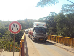 Trucks ferrying goods from Tanzania arrive at the Rusumo border post. (File photo)