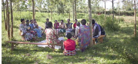 The women sit together and discuss their problems. (Photos By Maricke.)