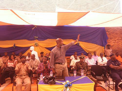 Internal Security MINISTER Sheikh Musa Fazil Harerimana acknowledges prisoners as other diginitaries look on (Photo; L.Nakayima)