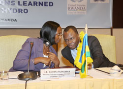 State minister Energy and Water (MININFRA) Hon. Coletha Ruhamya (L) consults with UN Resident Coordinator Auru00e9lien Agbu00e9nonci (Photo; T. Kisambira)