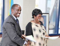 Former Health minister Dr. Richard Sezibera now EAC SG hands over to his successor Dr. Agnes Binagwaho yesterday (Photo T. Kisambira)
