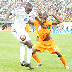 Andrew Buteera controls the ball against Ivory Coast in the Caf U-17 Championship early this year. The midfielder was one of the scorers yesterday. (File Photo)