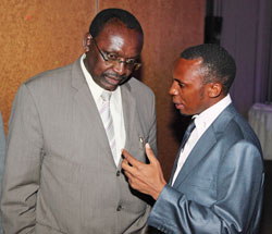 The Minister of Trade and Industry, Francois Kanimba chats with the CEO of Inspire Africa Nelson Tugume, during the launch of the TV reality show in Rwanda (Photo / T.Kisambira)