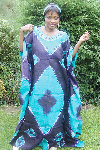 African woman dressed in a boubou.