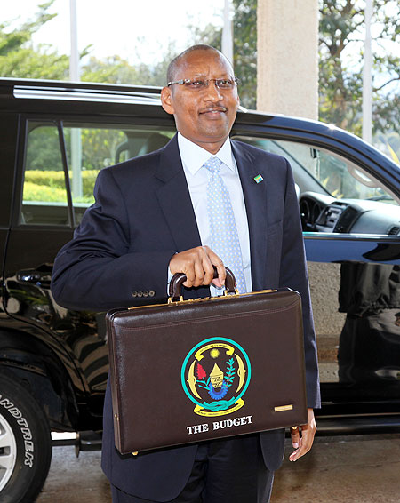 The Minister of Finance and Economic Planning. John Rwangombwa, arrives at the parliament to present the  Budget (Photo.T.Kisambira)