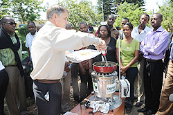  Rick Guthrie cooks to demonstrate how the enviro fuels stove works. (Photo J Mbanda)
