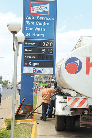 Fuel dealers expect pump prices to take a downward trend in 2011-12, owing to government's tax cut on fuel imports (File photo)