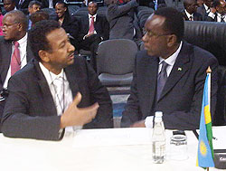 Prime Minister Makuza with Dr Mustafa Osman, advisor to the Presdient of Sudan during the meeting. (Courtesy photo)