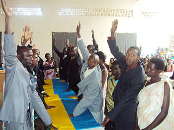Some of the couples taking marriage oaths in the presence of local officials (photo S Nkurunziza)