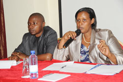 Chief Gender Monitor, Oda Gasinzigwa (R), with her deputy ,Ramadhan Barengayabo,  during the meeting yesterday. (Photo J Mbanda)