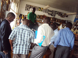 A group of district cooperative officers view products made by La COOPABU. (Photo J P Bucyensenge)