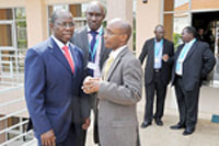 ICT Minister Ignace Gatare (R) speaks to the Director of the Telecommunication Development Bureau. Brahima Sanou (L) and Kebe Abdoulaye from Guinea. (Photo J Mbanda)