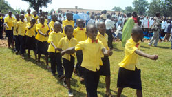 Children march during a national event to mark the Africa Child Day in Huye District yesterday. (Photo J P Bucyensenge)