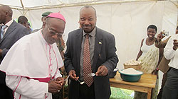 Western Province Governor, Celestin Kabahizi (R) and Bishop Jean Damascene Bimenyimana  (Photo L Nakayima)