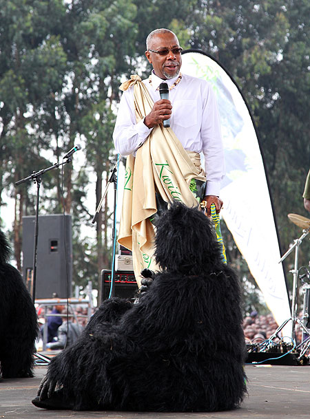 The Deputy Secretary General the Commonwealth, Ransfold Smith, naming one of the baby gorillas (Photo T. Kisambira)