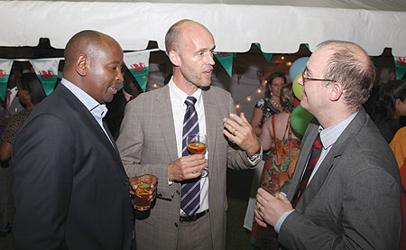 (L-R) Local Government Minister, James Musoni, High Counselor Mikael Lindvall of Sweden (C) and the UK High Commissioner, Benedict Llewellyn-Jones, during the Queenu2019s Birthday celebrations over the weekend. (Photo/ T. Kisambira).