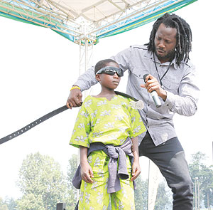 Lucky Boy! Ugandan artiste Bebe Cool was the star of the day after giving his Rwandan young fan his belt, shades and cash.