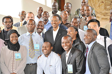 President Kagame poses with a group of journalists after the press conference yesterday (Photo Willis Shalita)