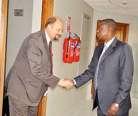  European Union envoy, Michel Arrion, together with Defence Minister, James Kabarebe, after their meeting yesterday (Photo T.Kisambira)