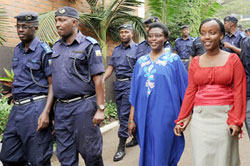 Deputy Ombudsman Bernadette Kanzayire (Second Right) interacts with Police officers after her presentation on Leadership and Integrity (Photo; J. Mbanda)
