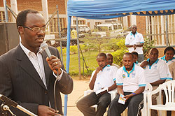 Kigali Mayor Fidele Ndayisaba addresses the audience during the launching of the women rights' project in Kimisagara on Friday (courtsey photo)