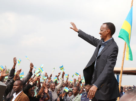 President Paul Kagame greets excited residents of Gicumbi. (Photo by T Kisambira)