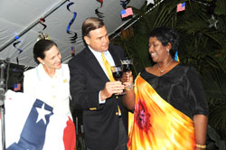 US Ambassador Stuart Symington (C), and Mrs Symington (L) with Health Minister, Dr. Agnes Binagwaho, at the US Independence  Day celebrations  (Photo /J Mbanda)
