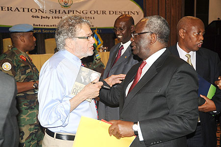 Dr. Gerry Caplan (L) chats with Ibrahim Gambari from UNAMID at the conference on Liberation as Gen. Patrick Nyamvumba (left) looks on. (Photo J Mbanda)
