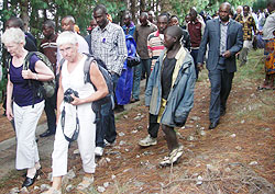  The visiting French nationals join other mouners in a walk to remember at Bisesero (photo S Nkurunziza)