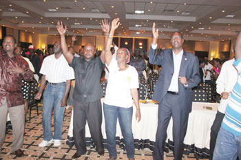 (Right), the Minister of Youth, Sport and Culture, Protais Mitali joined Tom Closeu2019s fans to celebrate the launch of his 3rd album.( courtesy photos)