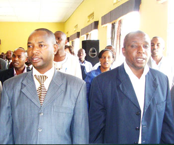 Rwamagana Mayor Neheme Uwimana (R) and Francois Ntiyotwagira of Ngoma district (L) at a past local leader's  meeting. (Photo/  S. Rwembeho)