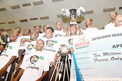 APR players posing with the 2010-11 Primus League trophy. Some of these players will not wear APR colours next season. (File photo)