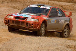 Fitidis powers his machine during the 2007 Irushanwa rally. The ace driver has registered for next week's KCB Pearl of Africa Uganda rally. (File photo)