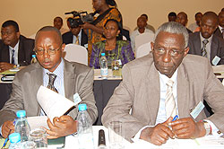  Auditor General Obadiah Biraro and NEC Boss Prof Chrysologue Karangwa during the meeting in Zanzibar (Photo G Muramira)