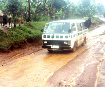 A passenger omnibus stuck in Zaza-Kibungo road which is earmarked for upgrading by local authorities. Photo S. Rwembeho.