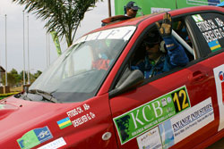 Fitidis waves to the crowd shortly after being flagged off during the 2009 KCB Rwanda Mountain Gorilla Rally. (File Photo)