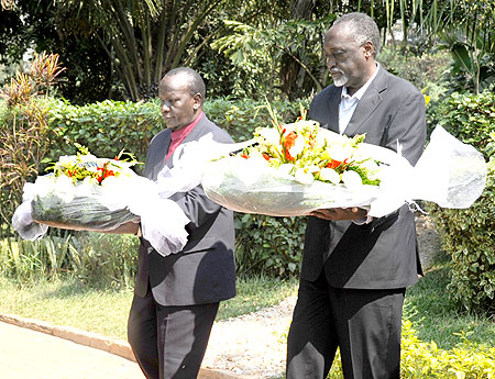The Ombudsman Tito Rutaremara (R) and his Burundi counterpart Mohamed Rukara pay tribute to Genocide Victims at Kigali Memorial Centre, Gisozi, yesterday. (Photo J Mbanda).
