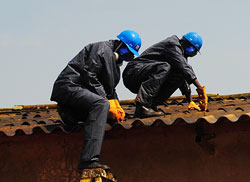 The Police will participate in the national exercise to dispose Asbestos roofing. (courtesy Photo)