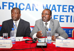 Usher Sylvain Jean Blaise from Cote du2019voire,(L) and Sylver Mugisha form Uganda during the African Water Association meeting in Kigali (Photo T.Kisambira)