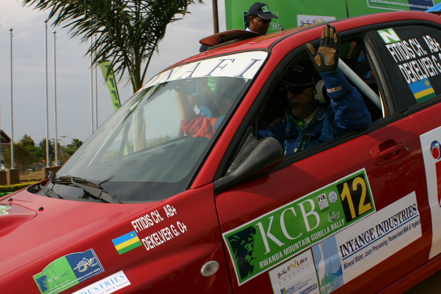 Fitidis waves to the crowd during the 2008 KCB Rwanda Mountain Goriila Rally. (File Photo)