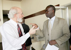  Dennis P. Garrity, the Director general of World Agroforestry Centre (L) chats with Stanislas Kamanzi, the minister of Minerals and forestry (T.Kisambira)