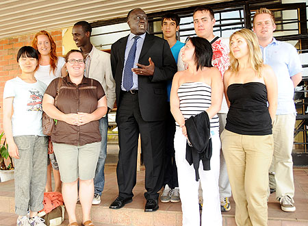 The Minister of Justice, Tharcisse Karugarama, with the students from Aegis after meeting them at his office, yesterday. (Photo J Mbanda)