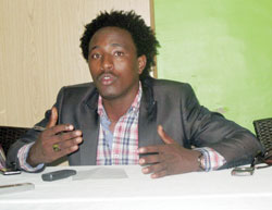 Alpha Rwirangira speaking at the press conference. ( Photo: L. Mbabazi)