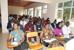 Students under the auspicies of the East African Community Students' Union take notes during the conference. (Courtesy photo)