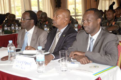  Governors Alphonse Munyentwali Southern Province (R) Celestin Kabahizi (Western) (C) and City Mayor Fidele Ndayisaba at an Imihigo review exercise last week. The New Times/John Mbanda
