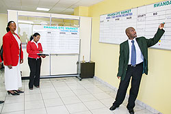 Stockbrokers during a trading session on the floor of the Rwanda Stock Exchange. Such businesses were not provided for under the VAT law. The New Times /File Photo