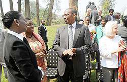 Finance Minister John Rwangombwa (C) chats with Diana Ofwona (L) of UN Women Rwanda and Victoria Akyeampong, the UNFPA Representative to Rwanda, during the Gender Budgeting conference, yesterday. The New Times/John Mbanda