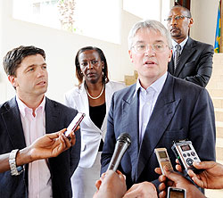 The UK Secretary of State for International Development, Andrew Mitchell, (R) speaks to reporters after meeting President Kagame at Village Urugwiro, yesterday. Looking on is Steven Crabb MP (L), the Minister of Foreign Affairs, Louise Mushikiwabo (c) and